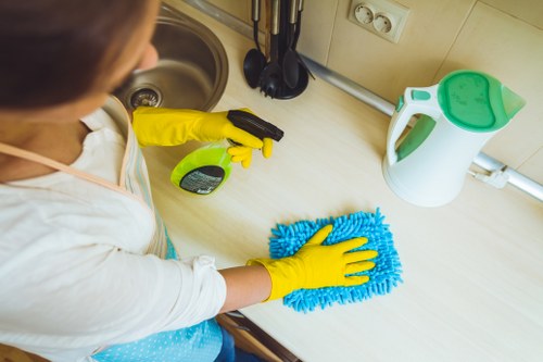 Professional carpet cleaning team applying final safety checks