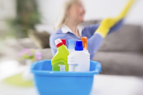 Cleaning staff assessing risks before carpet cleaning work